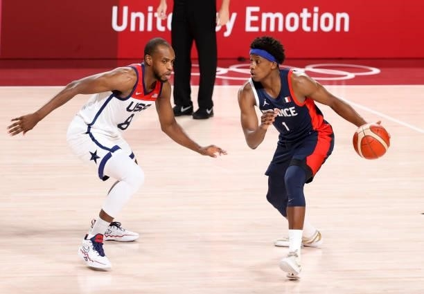 Frank Ntilikina of France, Khris Middleton of USA during the Men's Basketball Gold Medal Final between United States and France on day fifteen of the...