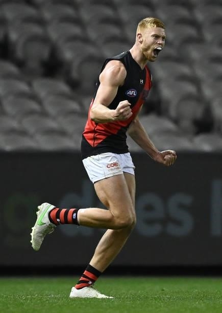 Peter Wright of the Bombers celebrates kicking a goal during the round 21 AFL match between Western Bulldogs and Essendon Bombers at Marvel Stadium...