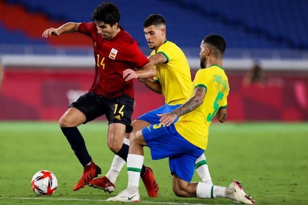 Carlos Soler of Spain competes for the ball during the Men's Gold Medal Match between Brazil and Spain on day fifteen of the Tokyo 2020 Olympic Games...