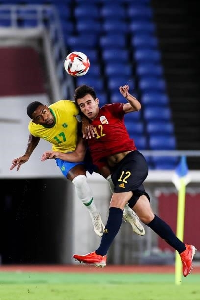 Eric Garcia of Spain competes for the ball with Malcom of Brazil during the Men's Gold Medal Match between Brazil and Spain on day fifteen of the...