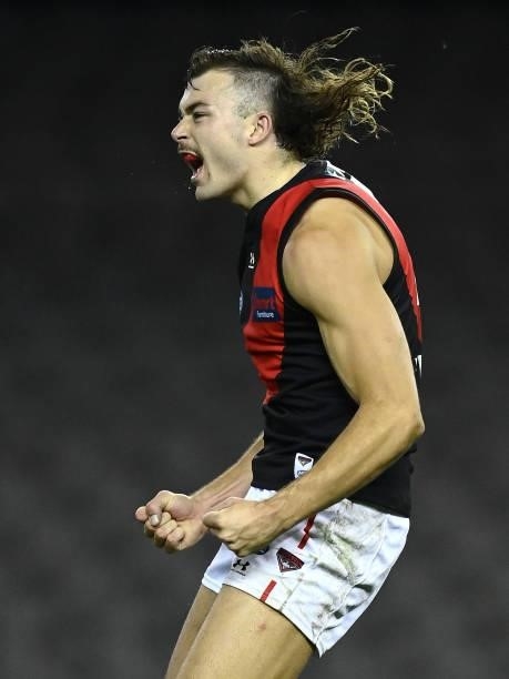 Sam Draper of the Bombers celebrates winning the round 21 AFL match between Western Bulldogs and Essendon Bombers at Marvel Stadium on August 08,...