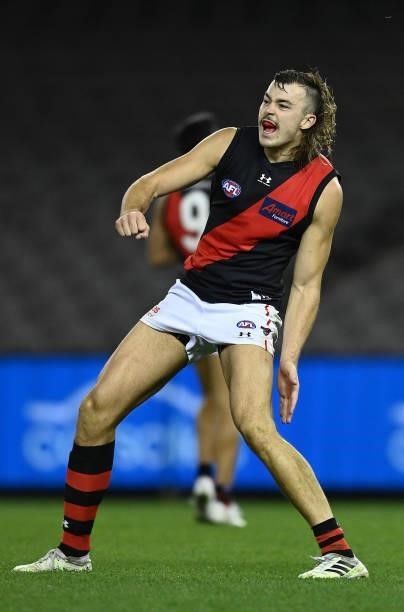 Sam Draper of the Bombers celebrates winning the round 21 AFL match between Western Bulldogs and Essendon Bombers at Marvel Stadium on August 08,...