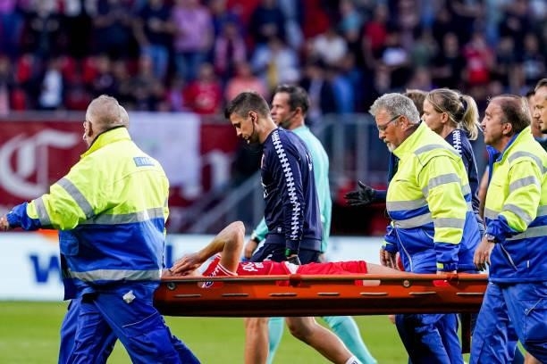 Ramiz Zerrouki of FC Twente in medical treatment due to injury carried in a stretcher off the pitch during the Preseason Friendly Match match between...