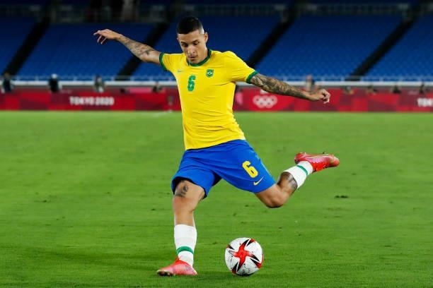 Guilherme Arana of Brazil pass the ball during the Men's Gold Medal Match between Brazil and Spain on day fifteen of the Tokyo 2020 Olympic Games at...