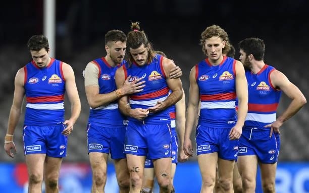 Marcus Bontempelli and Josh Bruce of the Bulldogs look dejected after losing the round 21 AFL match between Western Bulldogs and Essendon Bombers at...