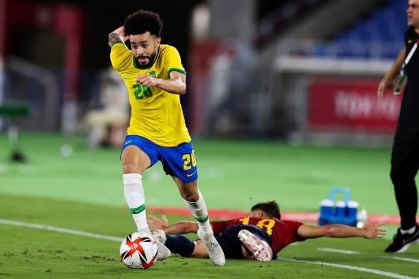 Claudinho of Brazil competes for the ball during the Men's Gold Medal Match between Brazil and Spain on day fifteen of the Tokyo 2020 Olympic Games...