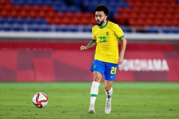Claudinho of Brazil pass the ball during the Men's Gold Medal Match between Brazil and Spain on day fifteen of the Tokyo 2020 Olympic Games at...