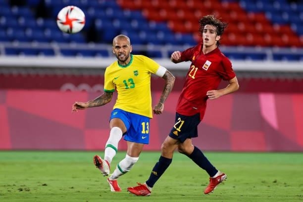 Dani Alves of Brazil pass the ball during the Men's Gold Medal Match between Brazil and Spain on day fifteen of the Tokyo 2020 Olympic Games at...