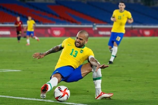 Dani Alves of Brazil competes for the ball during the Men's Gold Medal Match between Brazil and Spain on day fifteen of the Tokyo 2020 Olympic Games...
