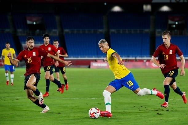 Richarlison of Brazil shots the ball during the Men's Gold Medal Match between Brazil and Spain on day fifteen of the Tokyo 2020 Olympic Games at...