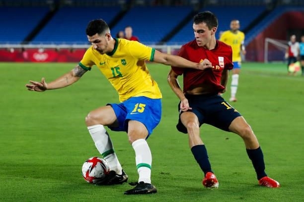 Nino of Brazil competes for the ball with Pedri Gonzalez of Spain during the Men's Gold Medal Match between Brazil and Spain on day fifteen of the...