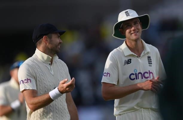 England bowlers Stuart Broad and James Anderson chat as they leave the field during day four of the First Test Match between England nd India at...