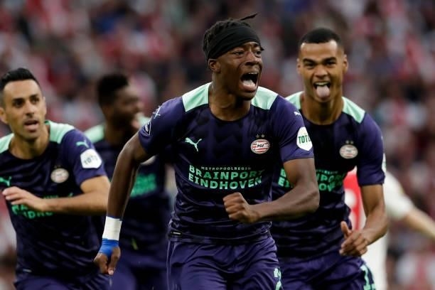 Noni Madueke of PSV celebrate first PSV goal of the evening during the Johan Cruijff Schaal match between Ajax and PSV at Johan Cruijff Arena on...