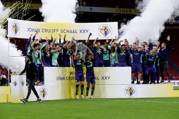 Celebrate winning the Johan Cruijff Schaal during the Johan Cruijff Schaal match between Ajax and PSV at Johan Cruijff Arena on August 7, 2021 in...