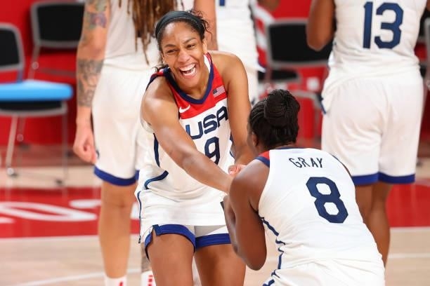 Ja Wilson and Chelsea Gray of Team United States celebrate after defeating Team Japan 90-75 to win the women's gold medal match between Team United...