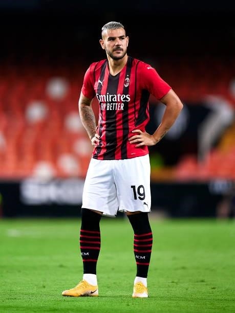Theo Hernandez of AC Milan looks on during a pre-season friendly match between Valencia CF and AC Milan at Estadi de Mestalla on August 04, 2021 in...