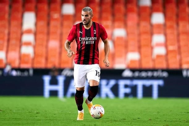 Theo Hernandez of AC Milan with the ball during a pre-season friendly match between Valencia CF and AC Milan at Estadi de Mestalla on August 04, 2021...