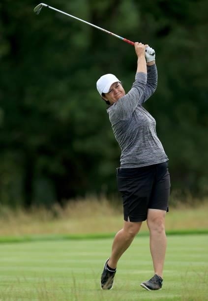 Becky Brewerton of Wales plays her tee shot on the par 4, fourth hole at the JCB Golf & Country Club during the Rose Ladies Series at JCB Golf &...