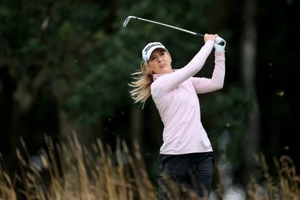 Lauren Taylor of England plays her tee shot on the par 3, fifth hole at the JCB Golf & Country Club during the Rose Ladies Series at JCB Golf &...