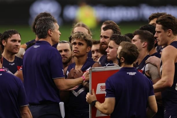 Justin Longmuir, head coach of the Dockers addresses his players at the three quarter time break during the round 21 AFL match between Fremantle...