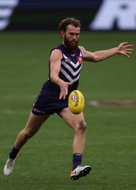 Connor Blakely of the Dockers in action during the round 21 AFL match between Fremantle Dockers and Brisbane Lions at Optus Stadium on August 08,...
