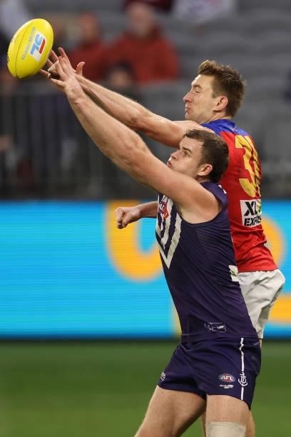 Sean Darcy of the Dockers and Harris Andrews of the Lions during the round 21 AFL match between Fremantle Dockers and Brisbane Lions at Optus Stadium...