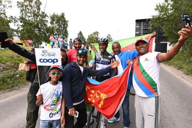 Henok Mulubrhan of Eritrea and Team Qhubeka Nexthash celebrates at finish line with compatriots during the 8th Arctic Race Of Norway 2021, Stage 4 a...
