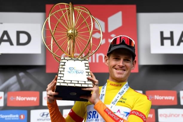 Ben Hermans of Belgium and Team Israel Start-Up Nation Yellow Leader Jersey celebrates at podium with the Trophy as race winner during the 8th Arctic...
