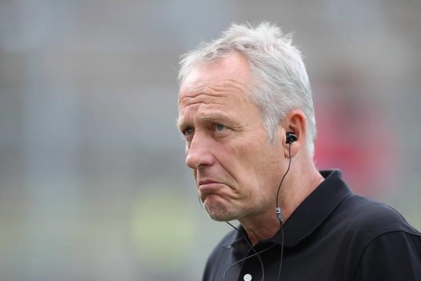 Christian Streich, Head coach of SC Freiburg reacts prior to the DFB Cup first round match between Würzburger Kickers and SC Freiburg at Flyeralarm...