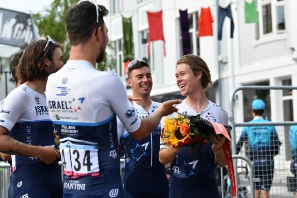 Sebastian Berwick of Australia and Team Israel Start-Up Nation catch Flowers Trophy at Podium during the 8th Arctic Race Of Norway 2021, Stage 4 a...