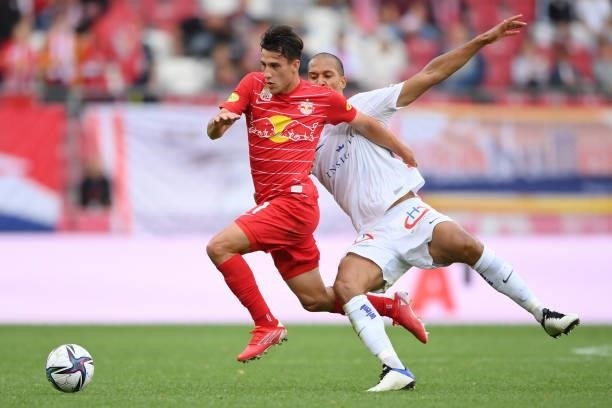 Nicolas Capaldo of FC Red Bull Salzburg and Christian Schoissengeyr of FK Austria Wien compete for the ball during the Admiral Bundesliga match...