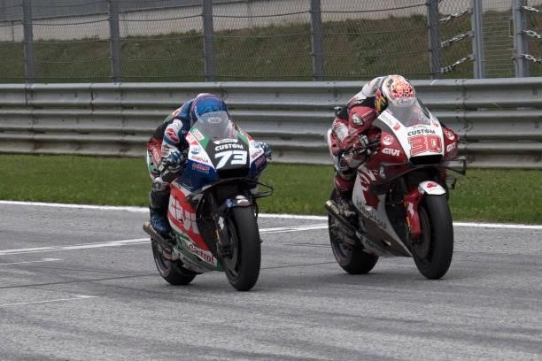 Takaaki Nakagami of Japan and LCR Honda Idemitsu leads Alex Marquez of Spain and LCR Honda Castrol during the MotoGP race during the MotoGP of Styria...