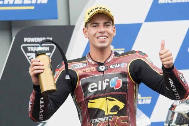Augusto Fernandez of Spain and Elf Marc VDS Racing Team celebrates the third place under the podium at the end of the Moto2 race during the MotoGP of...