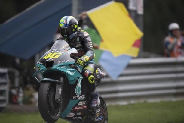 Valentino Rossi of Italy and Petronas Yamaha SRT lifts the front wheel and greets the fans during the MotoGP race during the MotoGP of Styria - Race...
