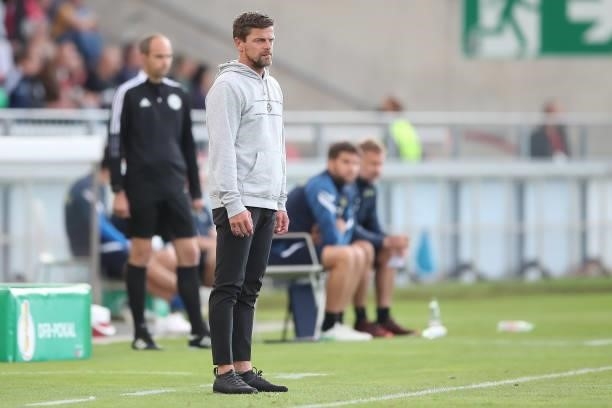 Torsten Ziegner, Head coach of Wuerzburger Kickers reacts during the DFB Cup first round match between Würzburger Kickers and SC Freiburg at...