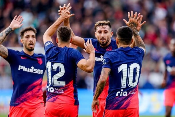 Angel Correa of Atletico Madrid celebrates after scoring his teams first goal during the Preseason Friendly Match match between Feyenoord and...