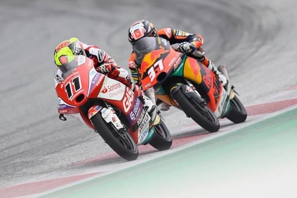 Sergio Garcia of Spain and Aspar Team Moto3 leads Pedro Acosta of Spain and Red Bull KTM Ajo during the Moto3 race during the MotoGP of Styria - Race...