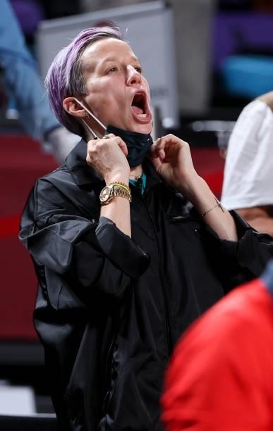 Megan Rapinoe cheers for her fiancee Sue Bird and Team USA during the Women's Basketball Gold Medal Final between United States and Japan on day...