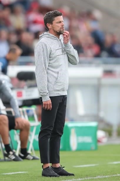Torsten Ziegner, Head coach of Wuerzburger Kickers reacts during the DFB Cup first round match between Würzburger Kickers and SC Freiburg at...