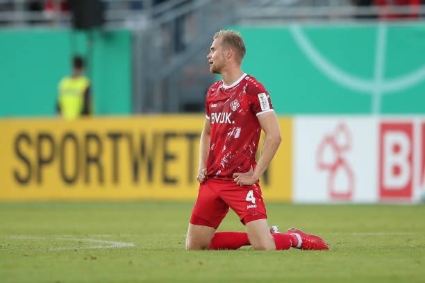 Lars Dietz of Wuerzburger Kickers reacts disappointed after the DFB Cup first round match between Würzburger Kickers and SC Freiburg at Flyeralarm...