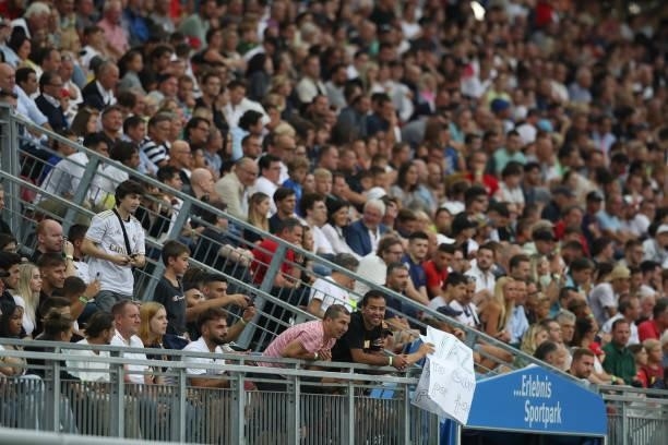 Fans cheer during the Pre-season friendly match between Real Madrid and AC Milan at Worthersee Stadion on August 08, 2021 in Klagenfurt, Austria.