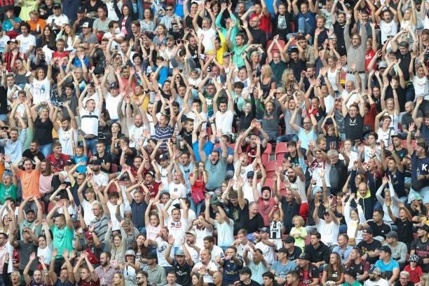 Fans cheer during the Pre-season friendly match between Real Madrid and AC Milan at Worthersee Stadion on August 08, 2021 in Klagenfurt, Austria.