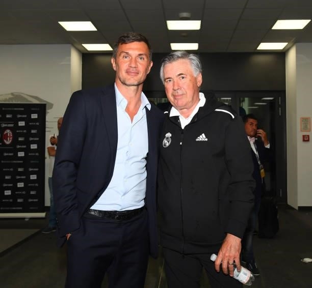 Technical Area Director AC Milan Paolo Maldini and head coach Real Madrid Carlo Ancelotti pose for a photo after the pre-season friendly match...