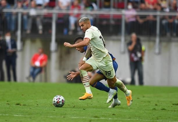 Theo Hernandez of AC Milan in action during the pre-season friendly match between Real Madrid and AC Milan at Worthersee Stadion on August 08, 2021...