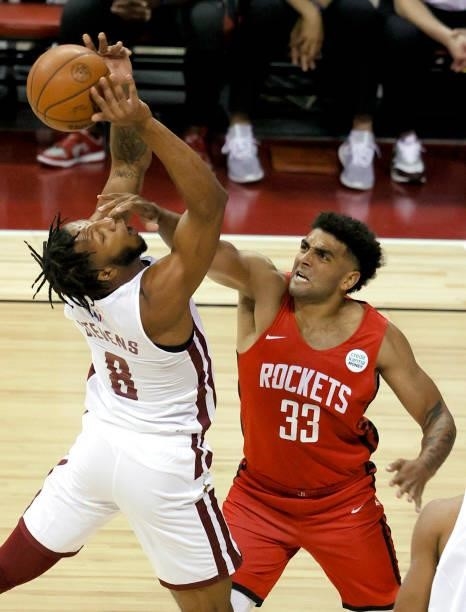 Lamar Stevens of the Cleveland Cavaliers shoots against Anthony Lamb of the Houston Rockets during the 2021 NBA Summer League at the Thomas & Mack...