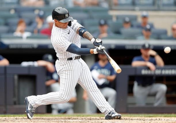 Gleyber Torres of the New York Yankees singles in the fourth inning against the Seattle Mariners at Yankee Stadium on August 08, 2021 in New York...