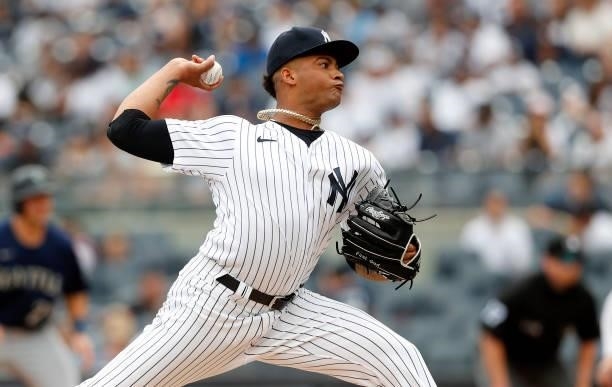 Luis Gil of the New York Yankees in action against the Seattle Mariners at Yankee Stadium on August 08, 2021 in New York City. The Mariners defeated...