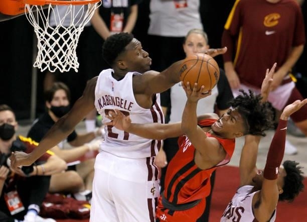 Mfiondu Kabengele of the Cleveland Cavaliers blocks a shot by Jalen Green of the Houston Rockets during the 2021 NBA Summer League at the Thomas &...