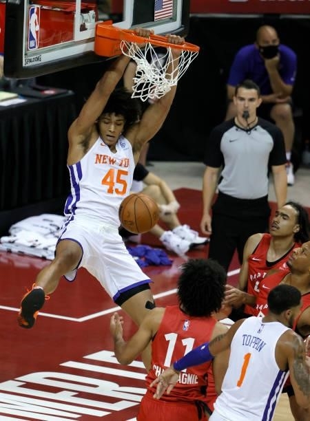 Jericho Sims of the New York Knicks dunks against the Toronto Raptors during the 2021 NBA Summer League at the Thomas & Mack Center on August 8, 2021...
