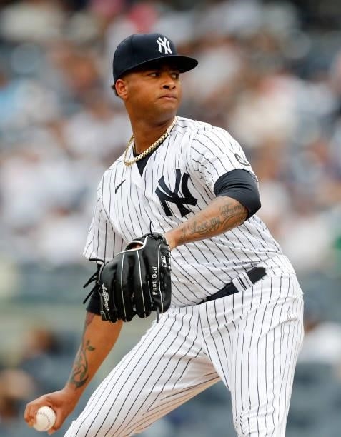Luis Gil of the New York Yankees in action against the Seattle Mariners at Yankee Stadium on August 08, 2021 in New York City. The Mariners defeated...